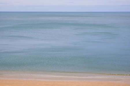 Landscape of beach in morning sky background.の写真素材