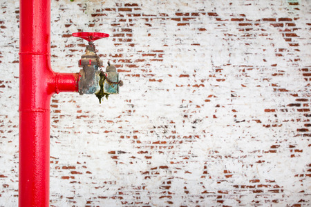 Old fire pipe system close up.の写真素材