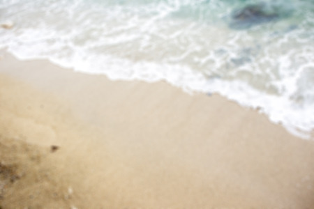 Blur image of sea wave and the beach.の写真素材