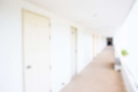 Blur image of walk way in hotel background.の写真素材