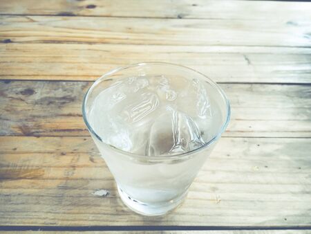 Iced water in glass close up.(Processed in vintage colour tone)の写真素材