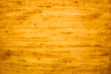Blur image of golden silk background.の写真素材