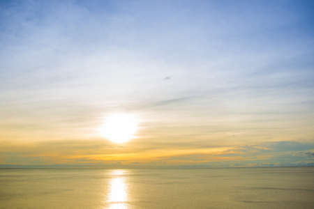 Landscape of far ocean in morning sky background.の写真素材
