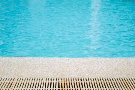 Swimming pool edge close up background.の写真素材