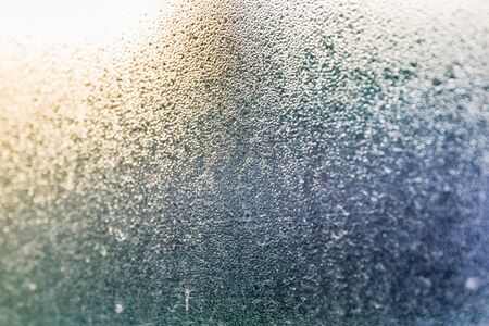 Small dew out side the window in the morning close up background.の写真素材