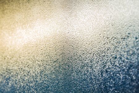 Small dew out side the window in the morning close up background.の写真素材