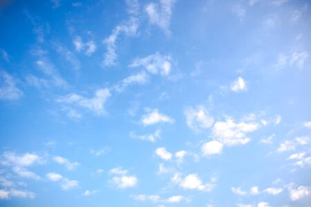 Beautiful a group of clouds in the blue sky during the sun shin background.(Processed in vintage colour tone)の写真素材