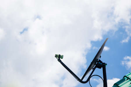 Home satellte dish on the roof top close up.の写真素材