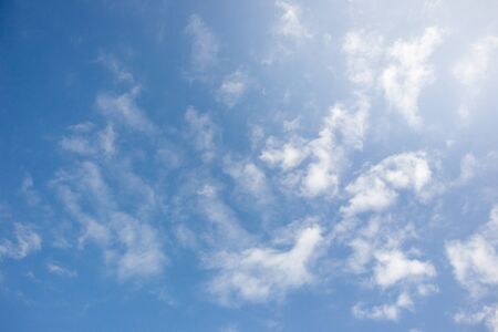 Beautiful a group of clouds in the blue sky during the sun shin background.の写真素材