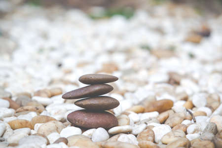 Stacked stones processed in vintage coclour tone.の写真素材