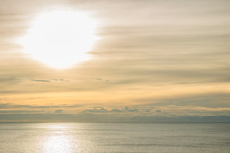Landscape of far ocean in morning sky background.の写真素材