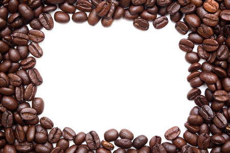 Organic coffee beans in white background close up.の写真素材