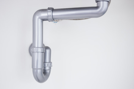 Dirty water pipe in kitchen.の写真素材