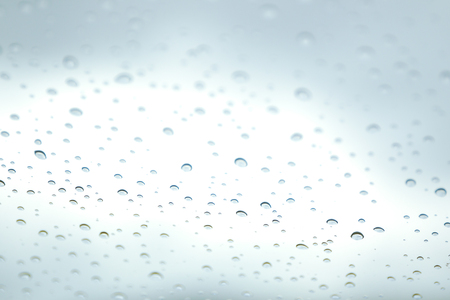 Rain drop on car glass in background.の写真素材