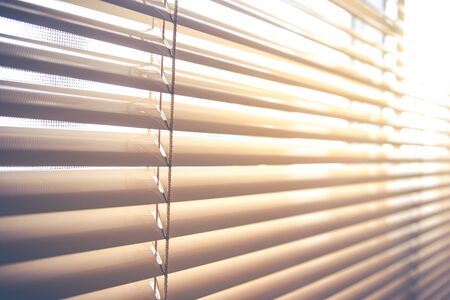 Modern blind curtain close up.(Processed in vintage colour tone)の写真素材