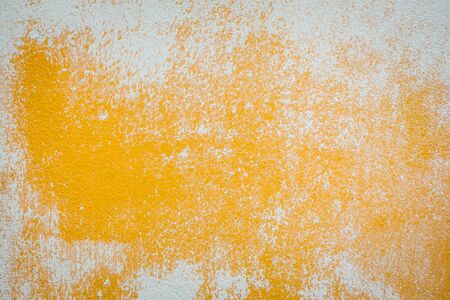 Old orange wall close up background.