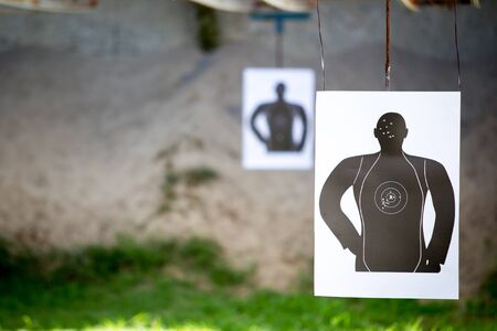Standard man shooting target close up.の写真素材