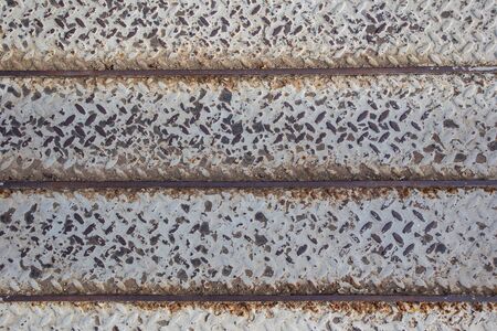 Aged rusty metal sheet board close up background.の写真素材