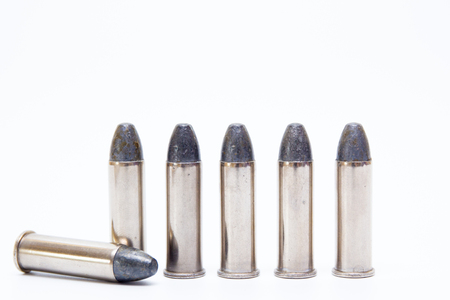 Silver Special  ammunition close up isolated on white background.
