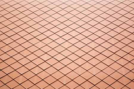 Old tile on roof close up background.の写真素材
