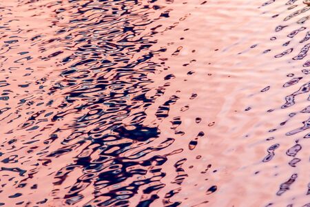 Beautiful colour on water surface background.の写真素材