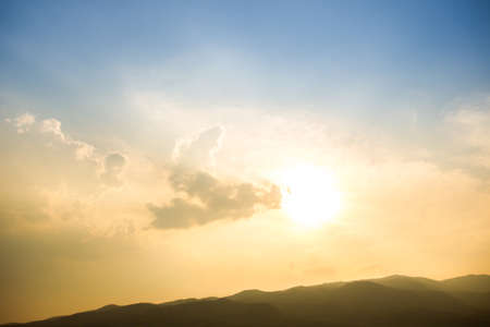 Beautiful sunset sky with the big mountain view.の写真素材