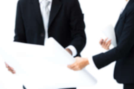 Image of co-working between businessman and engineer on white background.の写真素材