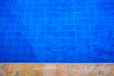 Swimming pool edge close up background.