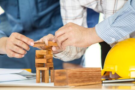 Photograph of engineer make the mock up wood brick close up.の写真素材