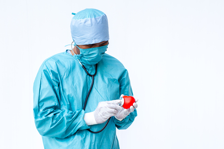 Specialist doctor checking on heart isolated on white background close up.の写真素材