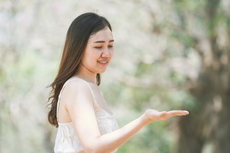 Asian girl age between 25-30 years old showing her hand close up.の写真素材
