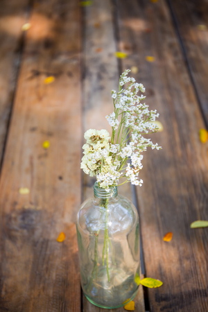 Small bouquet of flower decorated on a wooden table close up for the valentine festival.の写真素材