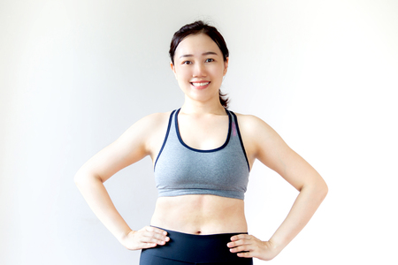 Slim body of women wearing a sportswear close up.の写真素材