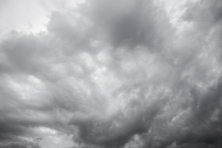 Dark storm clouds in the sky before a big storm coming.の写真素材