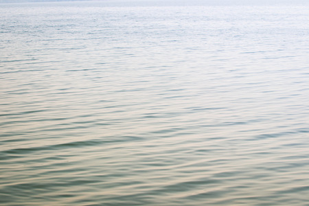 Peaceful surface of water in lake for background and other use.の写真素材