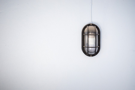 Vintage wall lamp installed outside of home close up.の写真素材