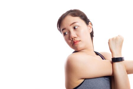 Asian pretty girl do arms stretching close up isolated on white background.