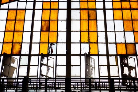 Beautiful ancient old windows decorated in the public address building.の写真素材