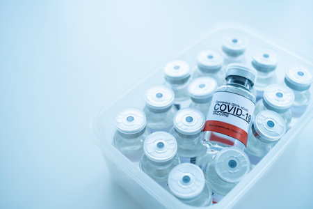 Coronavirus - 2019-nCoV or COVID-19 vaccine bottles for injection use only in a box. Coronavirus vaccine bottles with copyspace.の写真素材