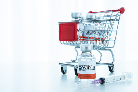 Coronavirus - 2019-nCoV or COVID-19 vaccine bottles for injection use only. Urgent vaccine research and production use in COVID-19 - Coronavirus disease. COVID-19 vaccine close up with copyspace.の写真素材