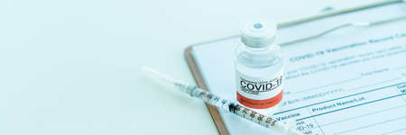 vaccine in a bottle and needleの写真素材