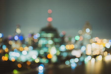 Beautiful lighting bokeh of city at night, defocused blur background of night city.の写真素材