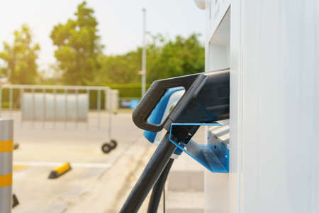 Photograph of the modern electric vehicle charging station or EV quick charging station for battery electric vehicle and plug-in hybrid electric vehicle.の写真素材