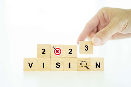 Word vision and mission on a wooden blocks, business strategic planning concept.の写真素材