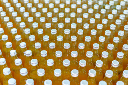 Lots of empty glass bottles in the carton prepared to feed into the manufacturing line.の写真素材