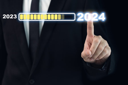 New year 2024 business growth and success concept. Businessman in action with a modern beautiful chart graphic.の写真素材
