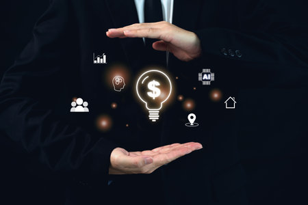 Unrecognizable businessman shows a virtual or holographic in investment and economic trend concept. Business idea and investment in technology and property.の写真素材