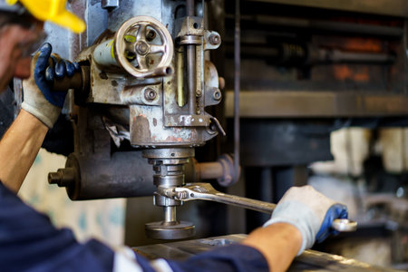 Professional caucasian white ethnicity male technician operating the heavy duty machine in the...