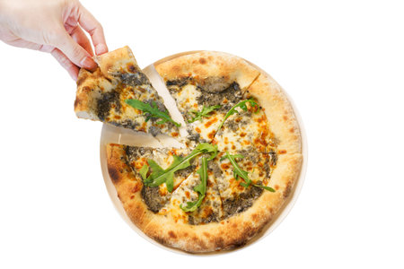 Unrecognizable woman's hand grabbing a piece of cheese pizza with isolated background in white.の写真素材