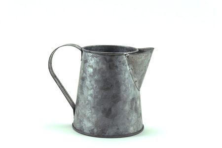 Vintage metal coffee pot on white backgroundの写真素材